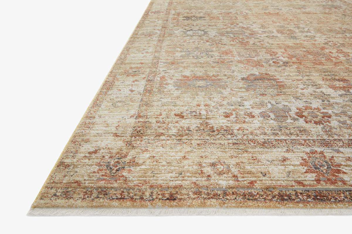 Traditional power-loomed rug corner detail with distressed motif, beige ground and rust highlights