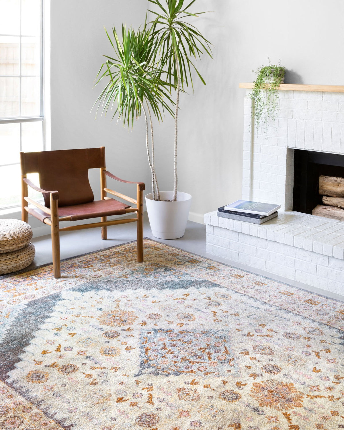 Transitional area rug with distressed medallion pattern, gray-blue, cream, burnt orange