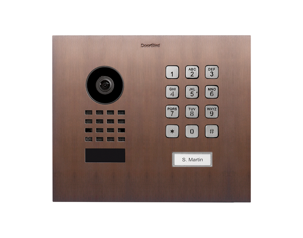 Bronze flush-mount video door station front with camera lens and numeric keypad