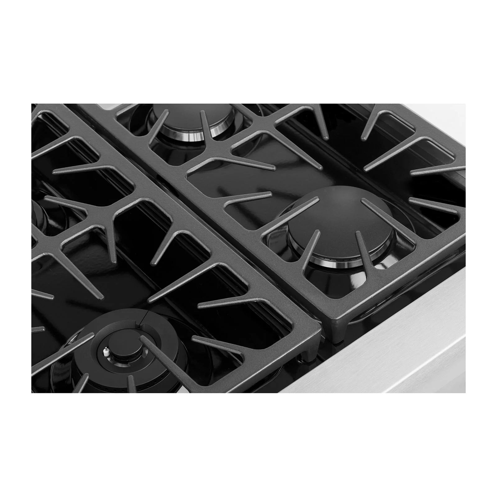 Close-up of black cast-iron burner grates on a stainless natural gas cooktop