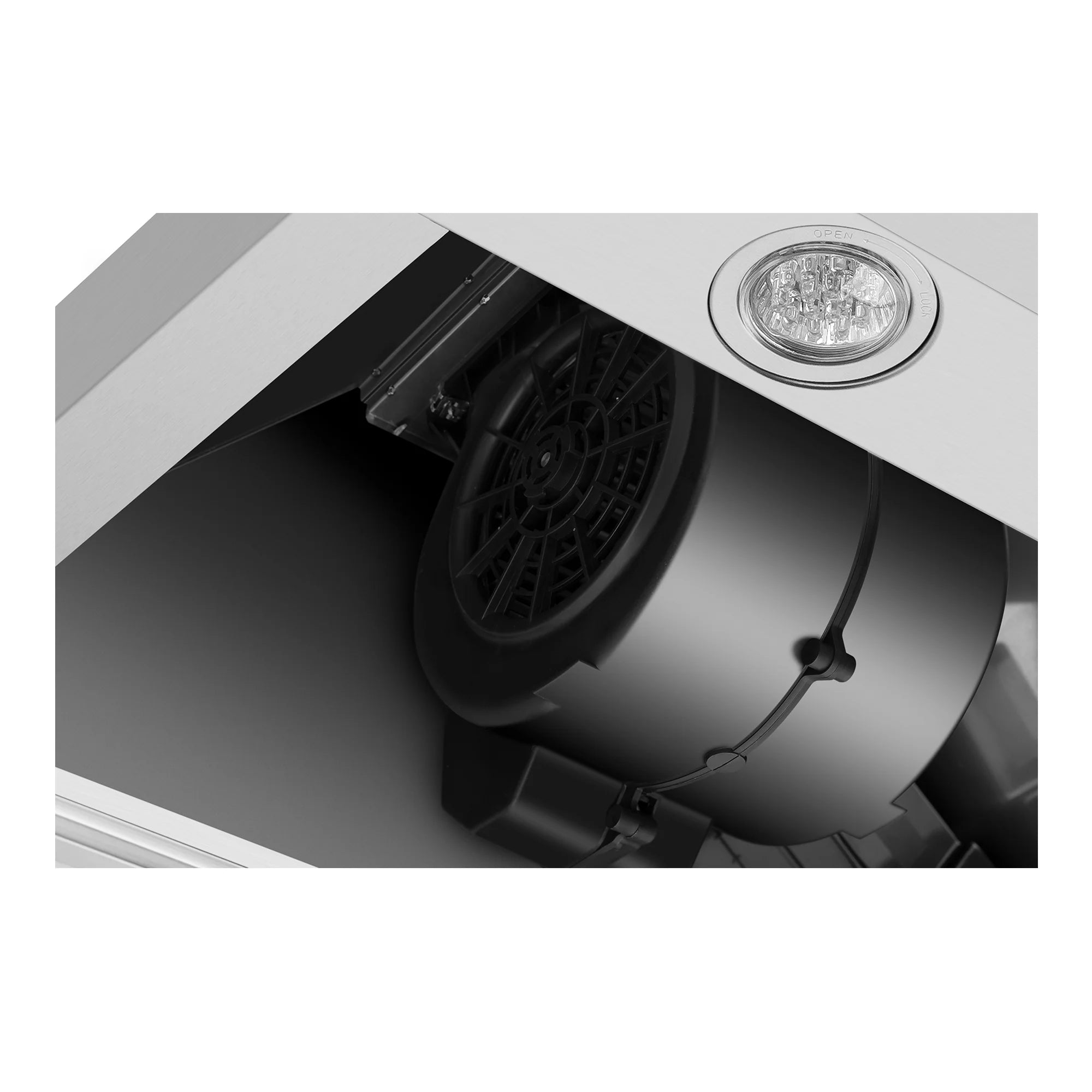 Range hood fan motor area with visible duct fan housing and wiring