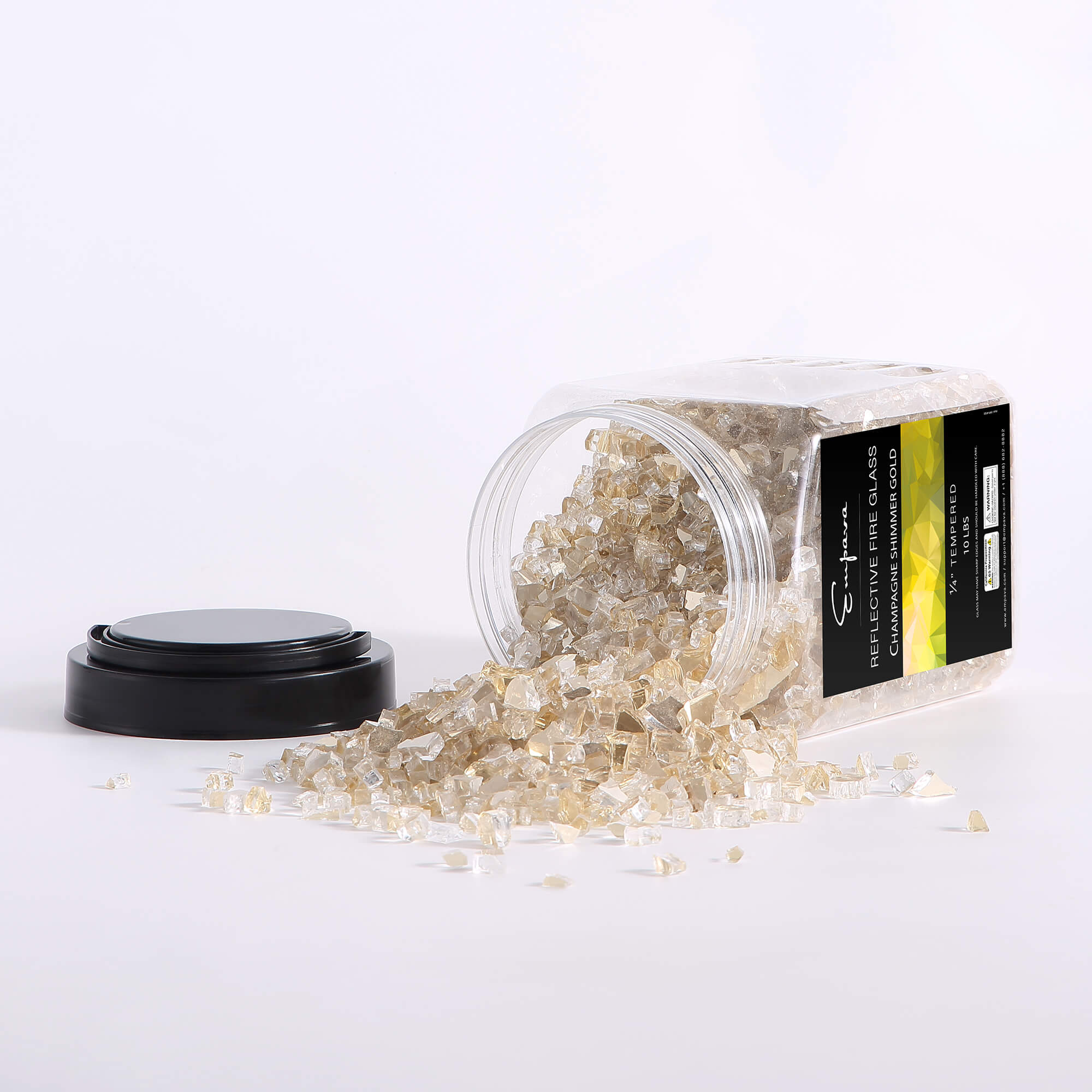 Tempered fire glass container with loose champagne-gold reflective shards