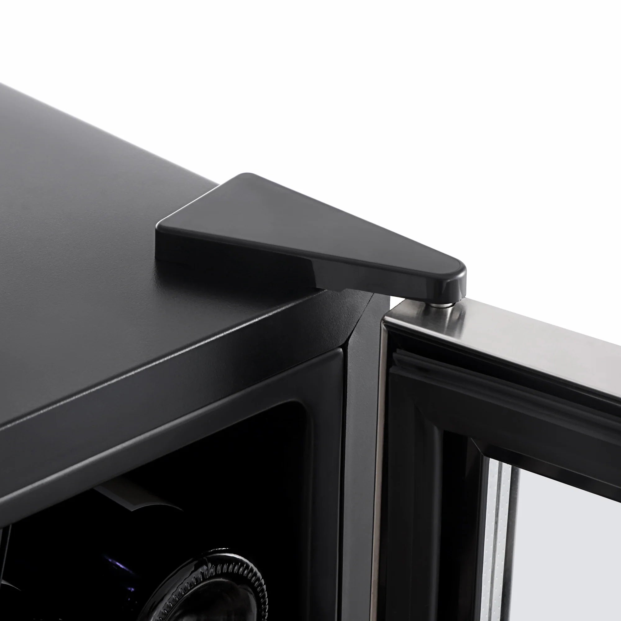 Tall wine cooler with black top handle and glass door frame edge