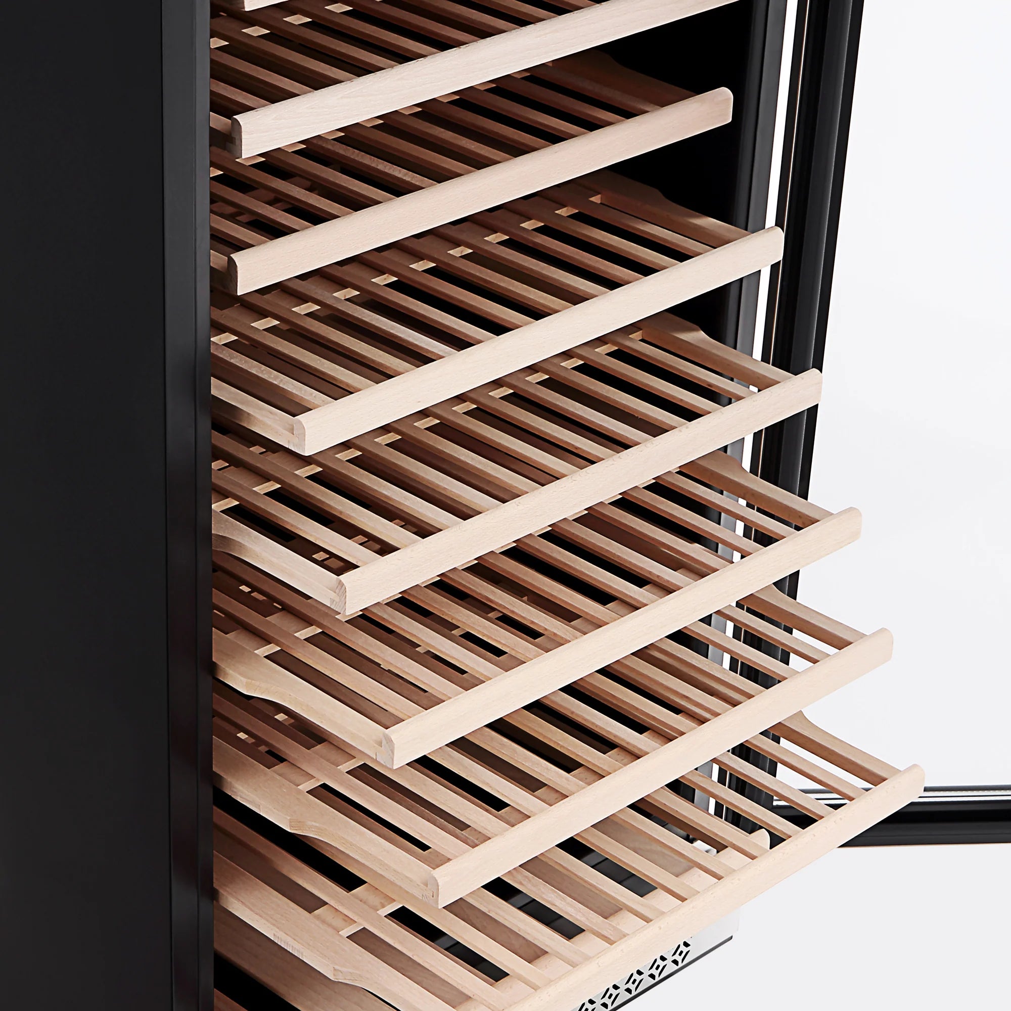 Wine cooler interior with wooden pull-out shelves and open door frame
