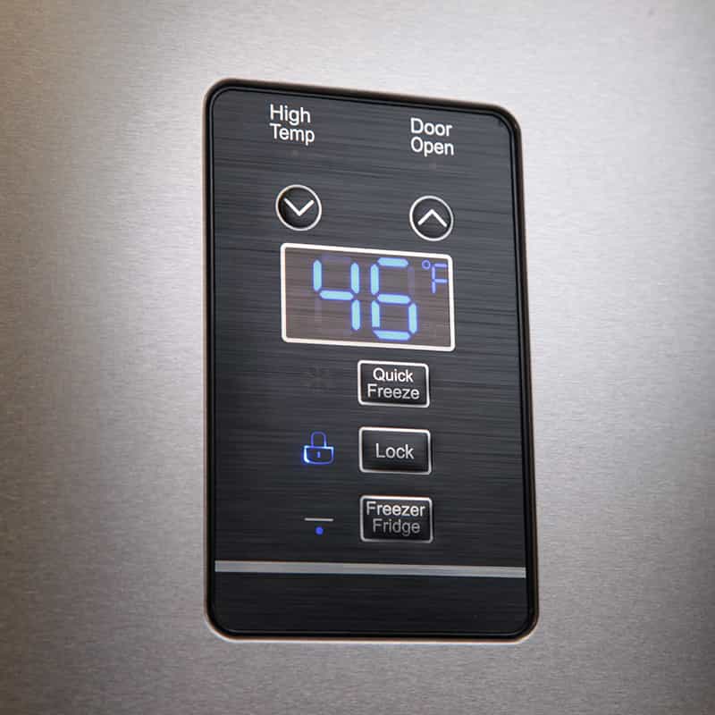 Digital refrigerator control panel with display, temperature buttons, and lock