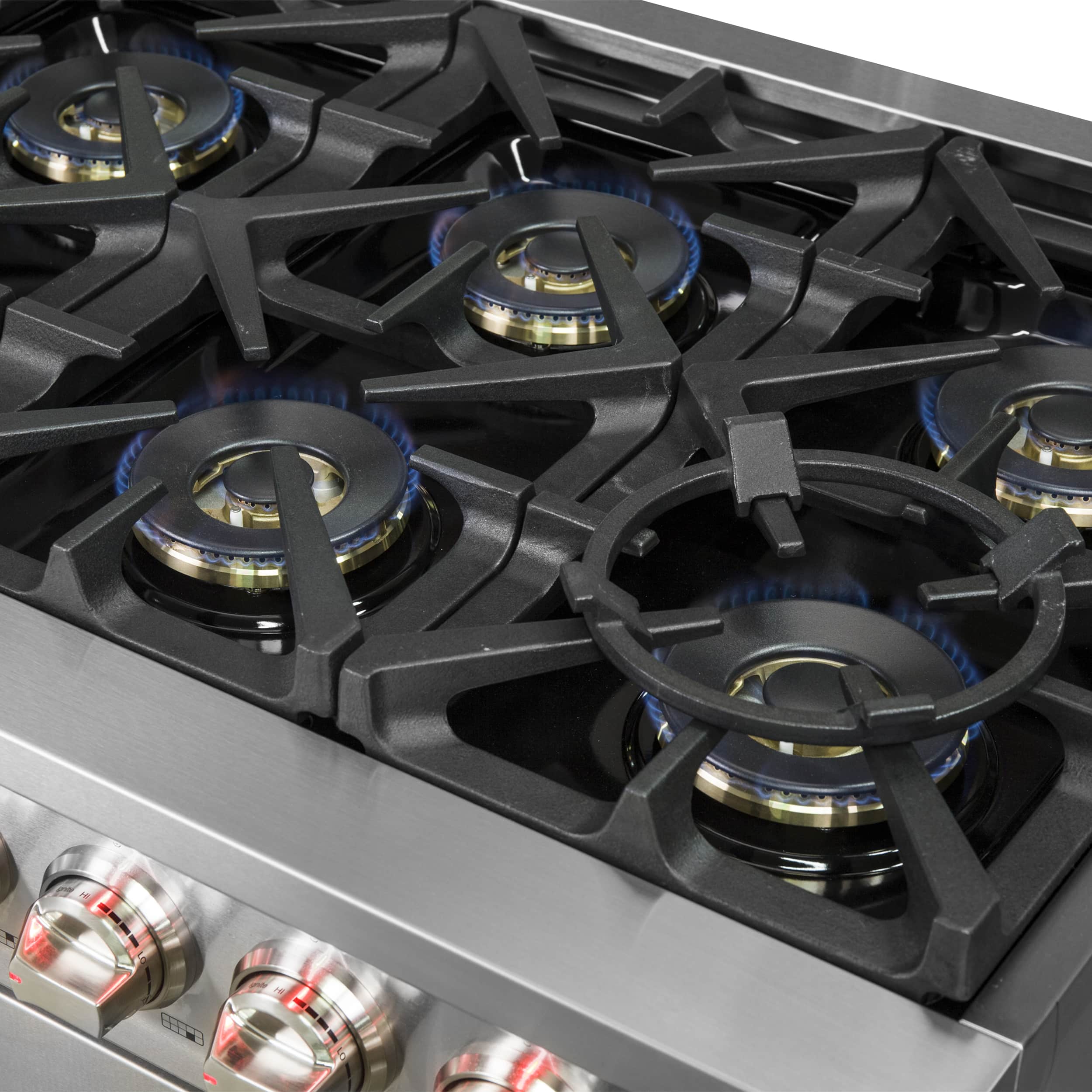 Stainless gas range cooktop with black burner grates and control knobs