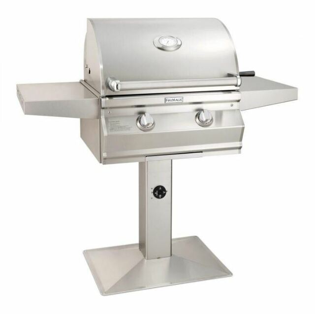 Fire Magic freestanding stainless steel propane grill on pedestal