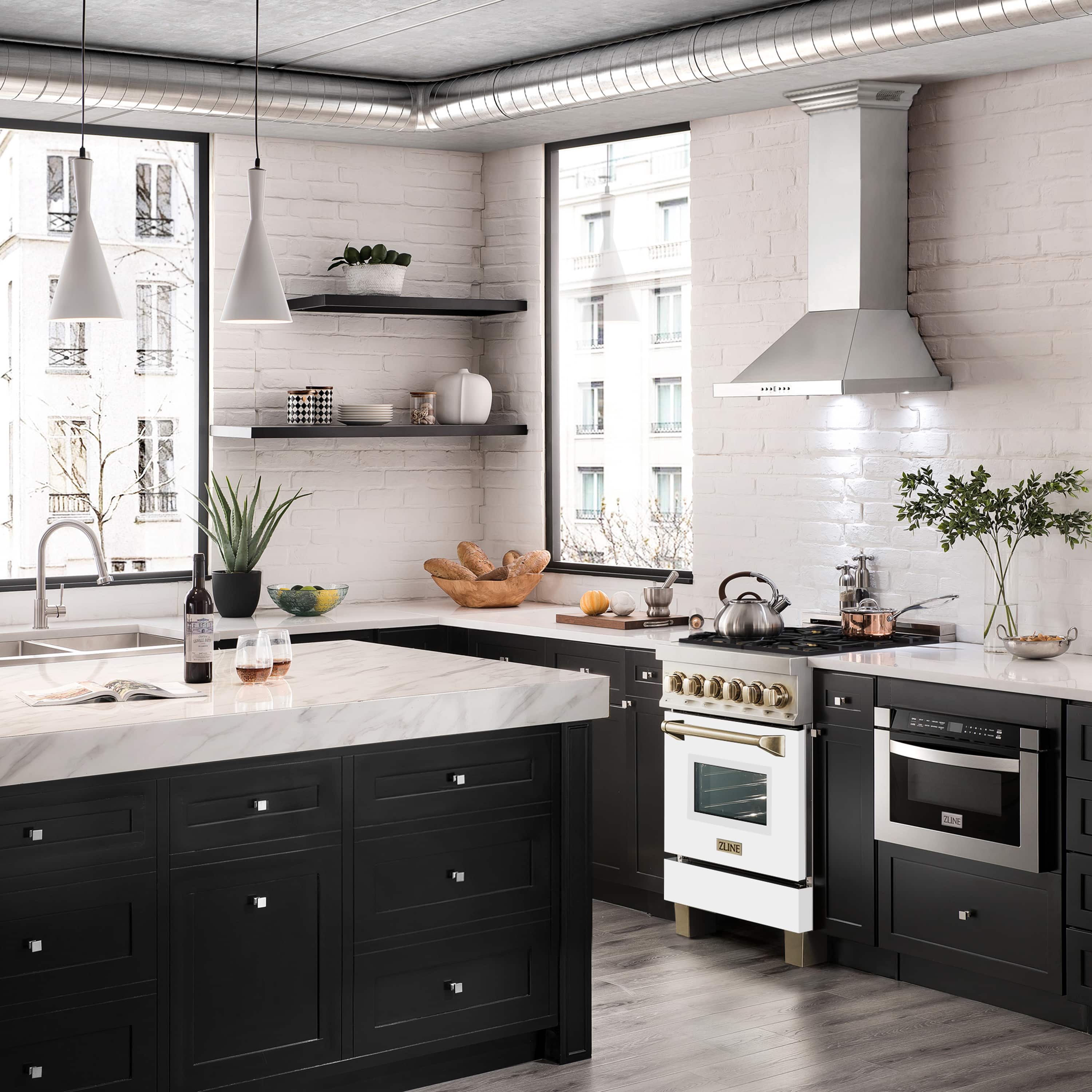 Stainless steel dual fuel range with white door and gold trim in kitchen