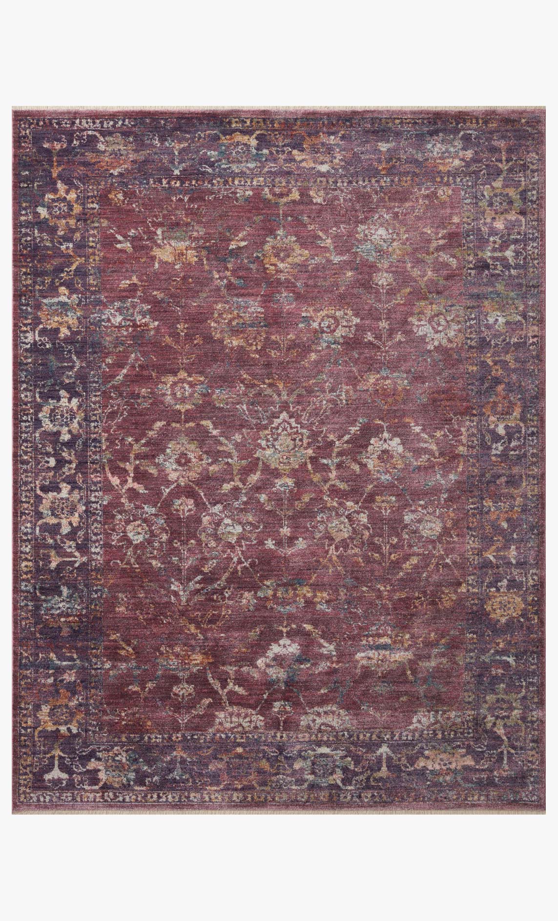 Traditional power-loomed area rug with ornate motif, grape and navy pattern border.