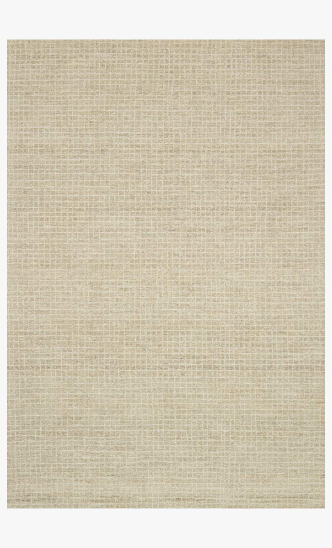 Antique ivory hooked area rug with subtle grid texture and flat rectangular border