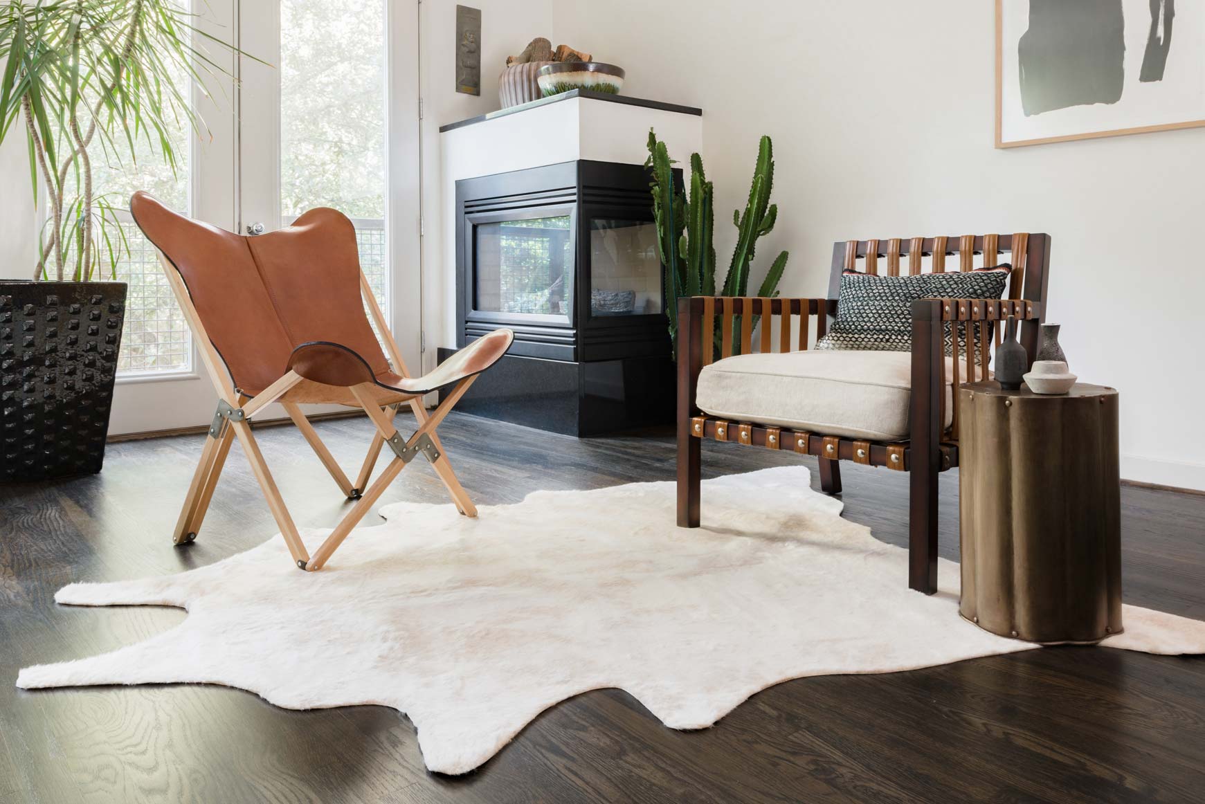 Ivory area rug with hide-inspired irregular mottled pattern, full view