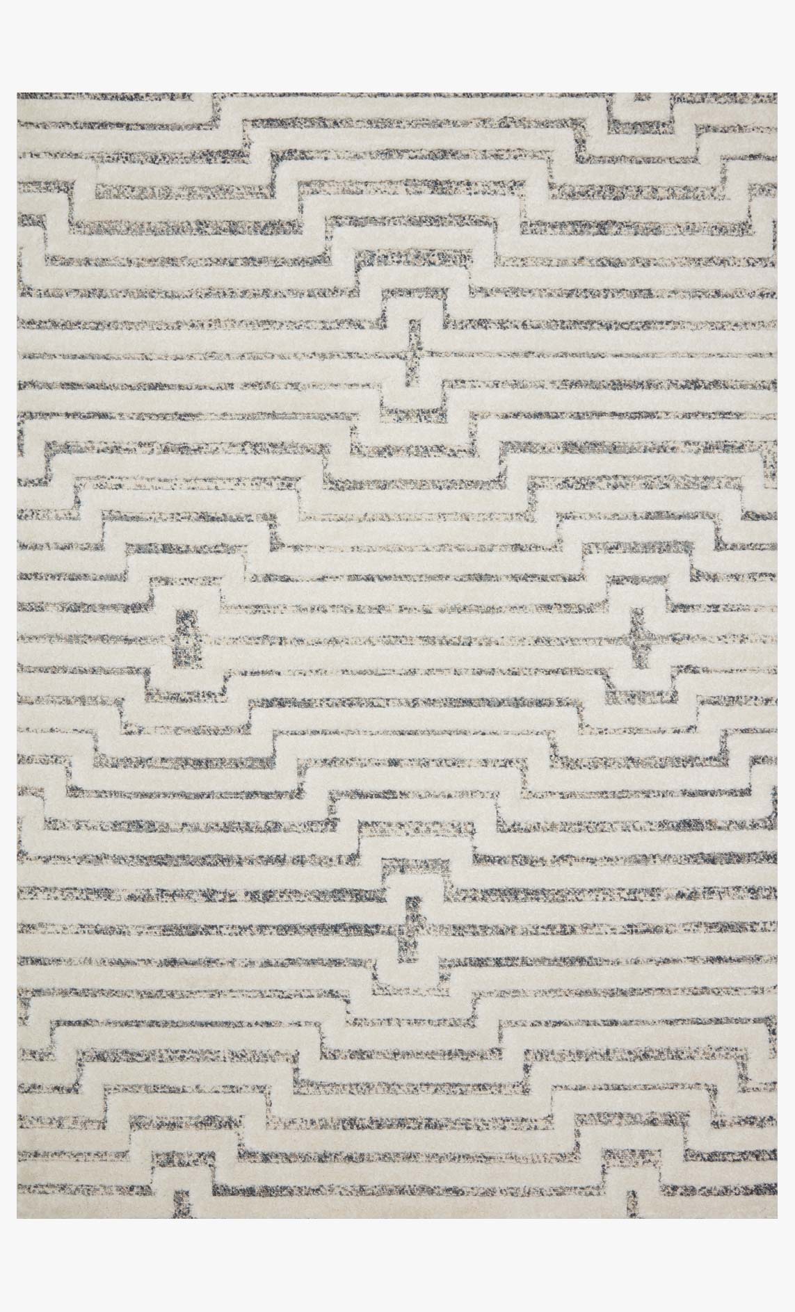 White power-loomed rug with sky-blue and dark zigzag medallion pattern