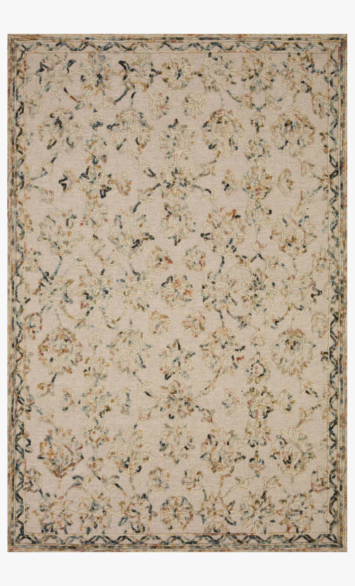 Light beige hooked rug with teal and tan floral vines pattern