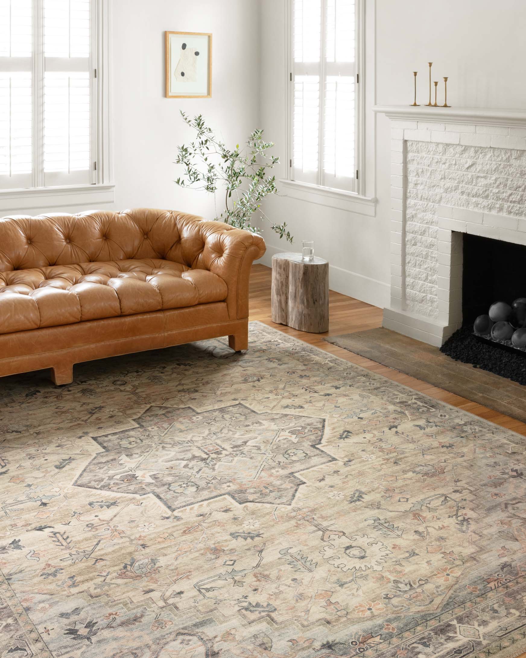 Multi-color and ivory traditional power loomed area rug with ornate vintage medallion