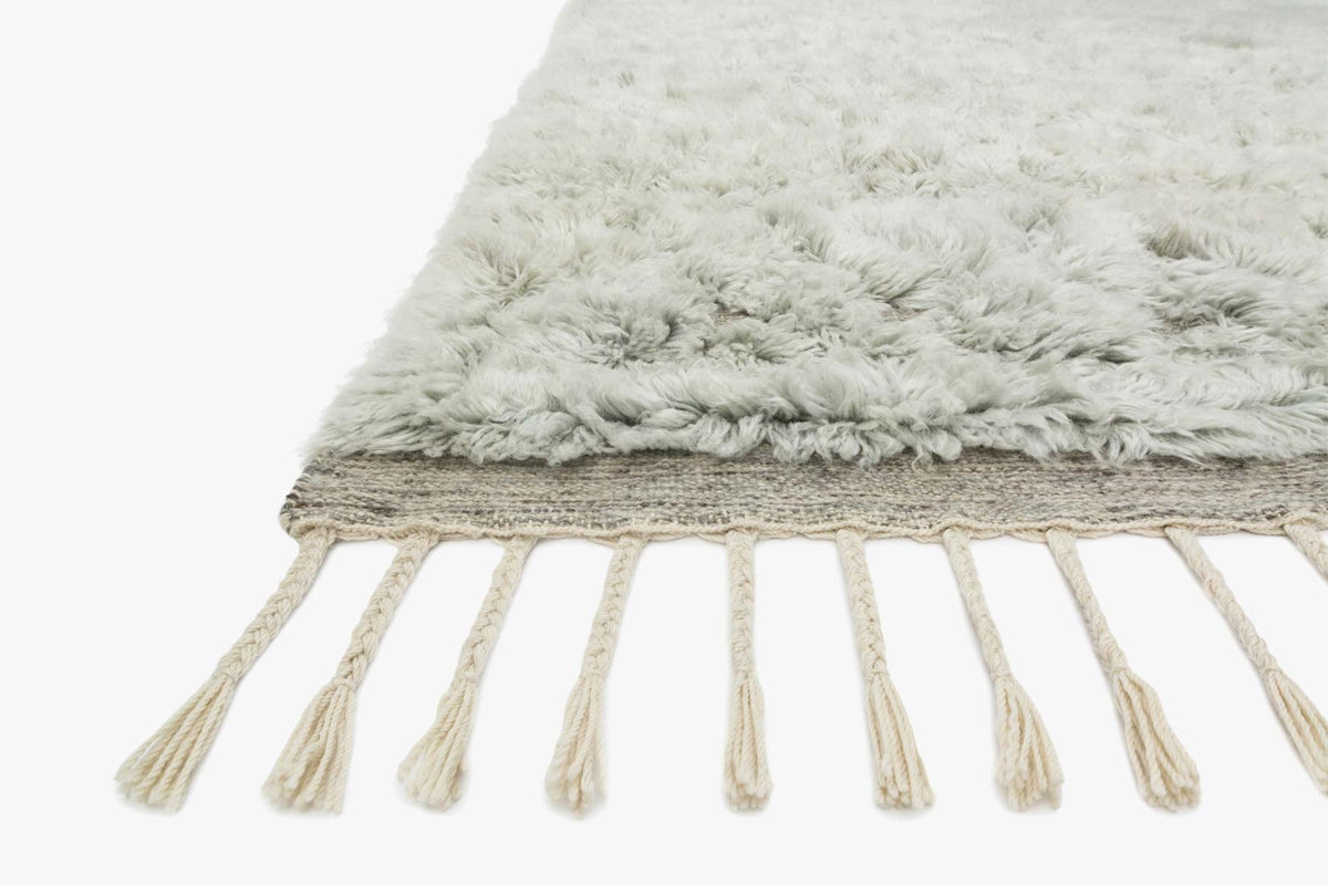 Grey and mist hand-loomed rug with soft shag pile and long fringe tassels