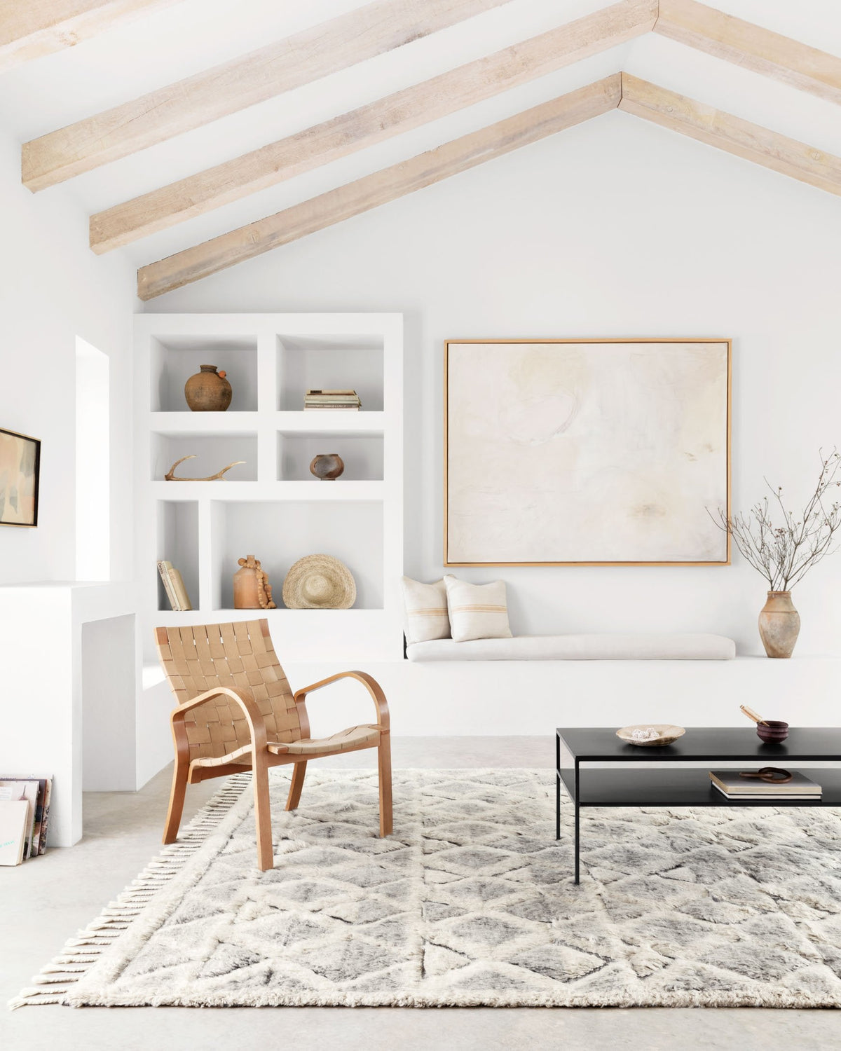 Contemporary area rug with faded smoke-gray textured surface and low, wispy pile