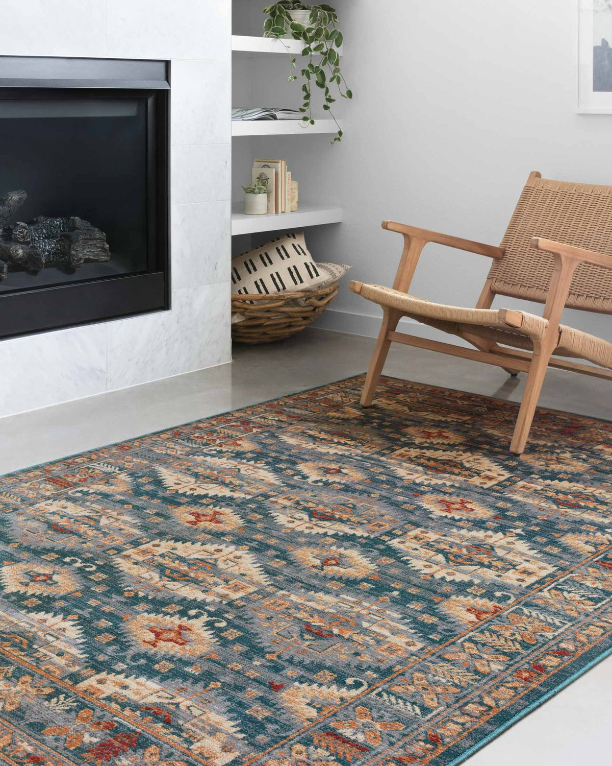 Lagoon patterned power-loomed rug in teal and orange with vintage-style medallion motifs
