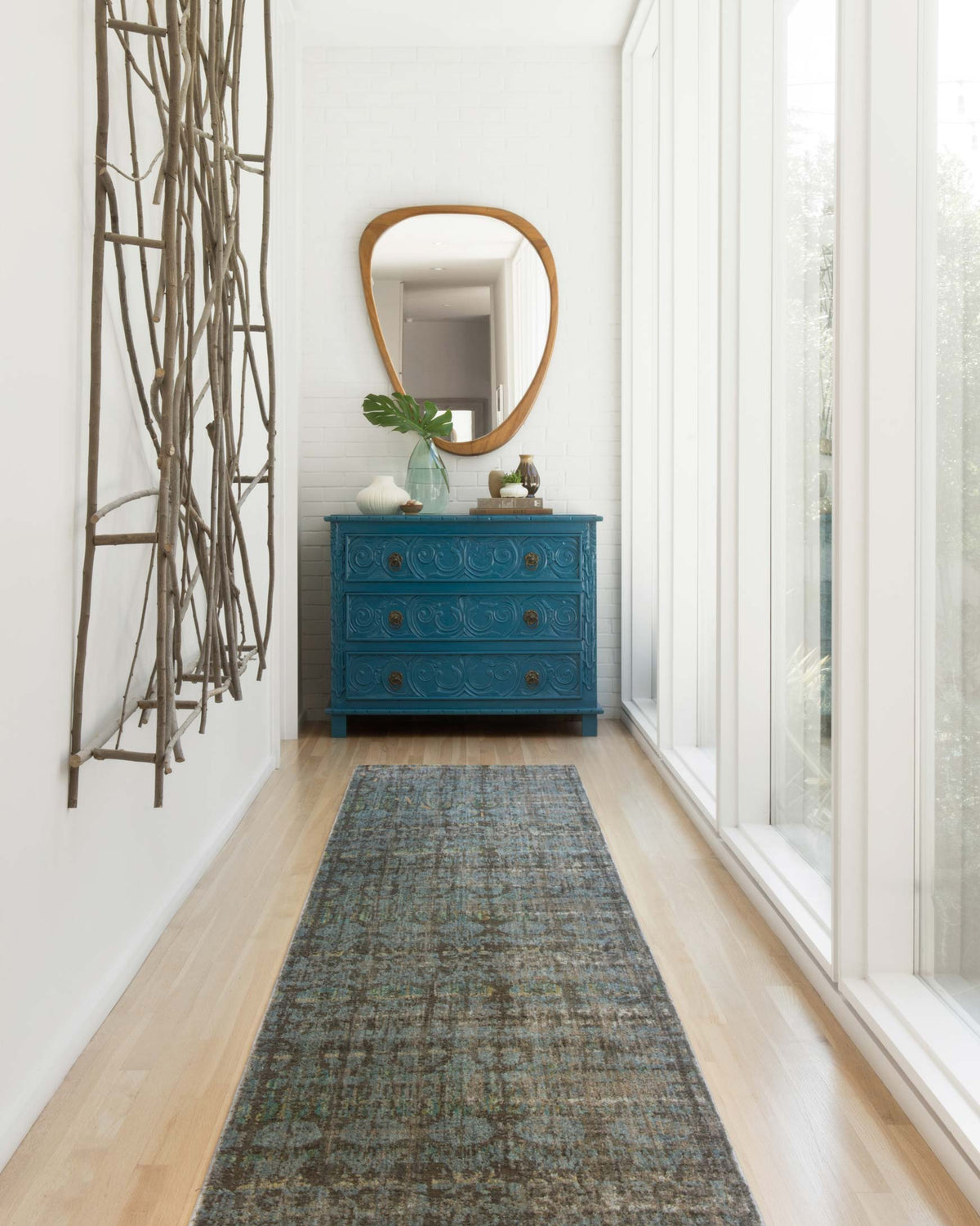 Contemporary power-loomed rug runner in steel and lagoon, distressed abstract pattern on floor