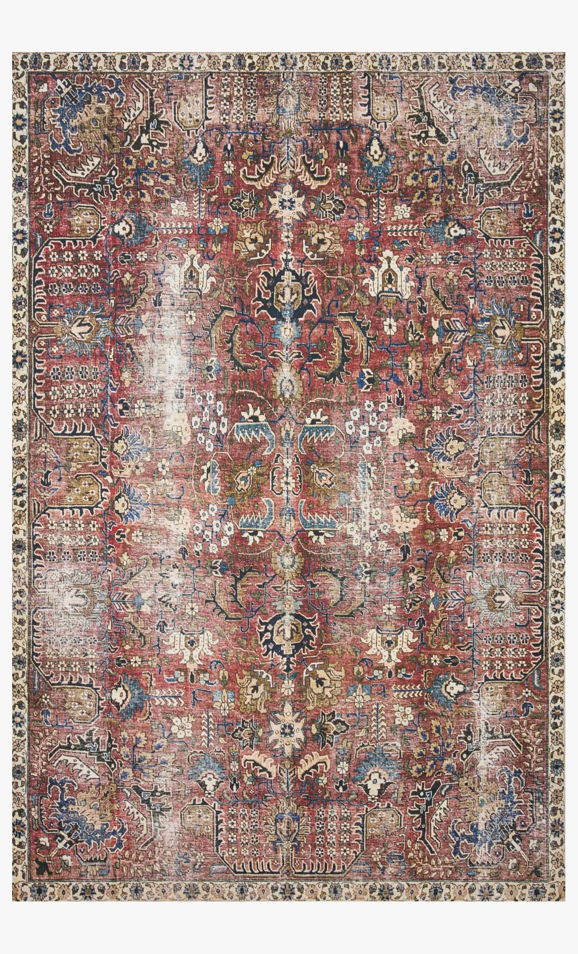 Traditional power-loomed rug with ornate red, blue, and cream medallion pattern