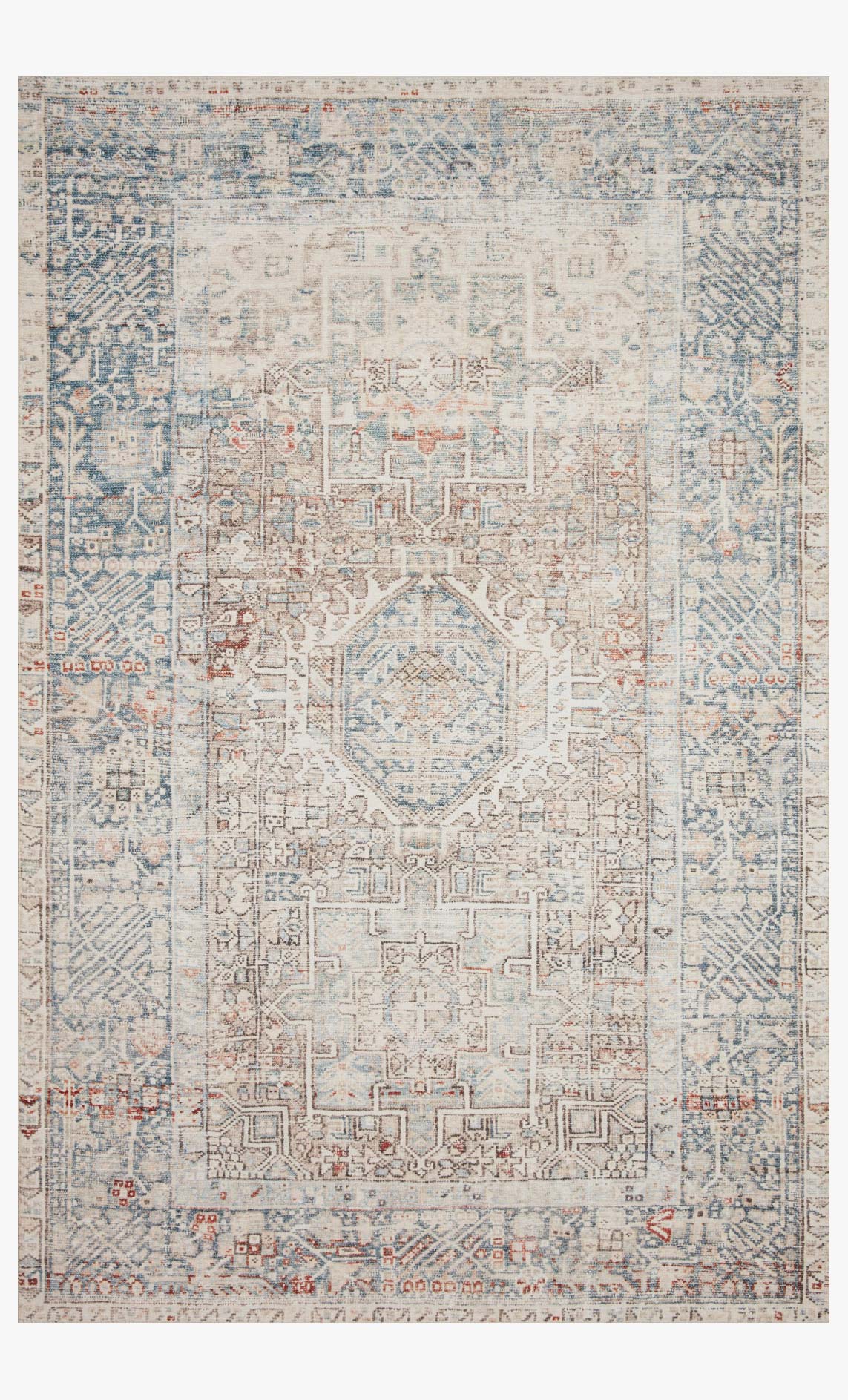 Traditional power loomed rug with cream base, blue and rust geometric pattern
