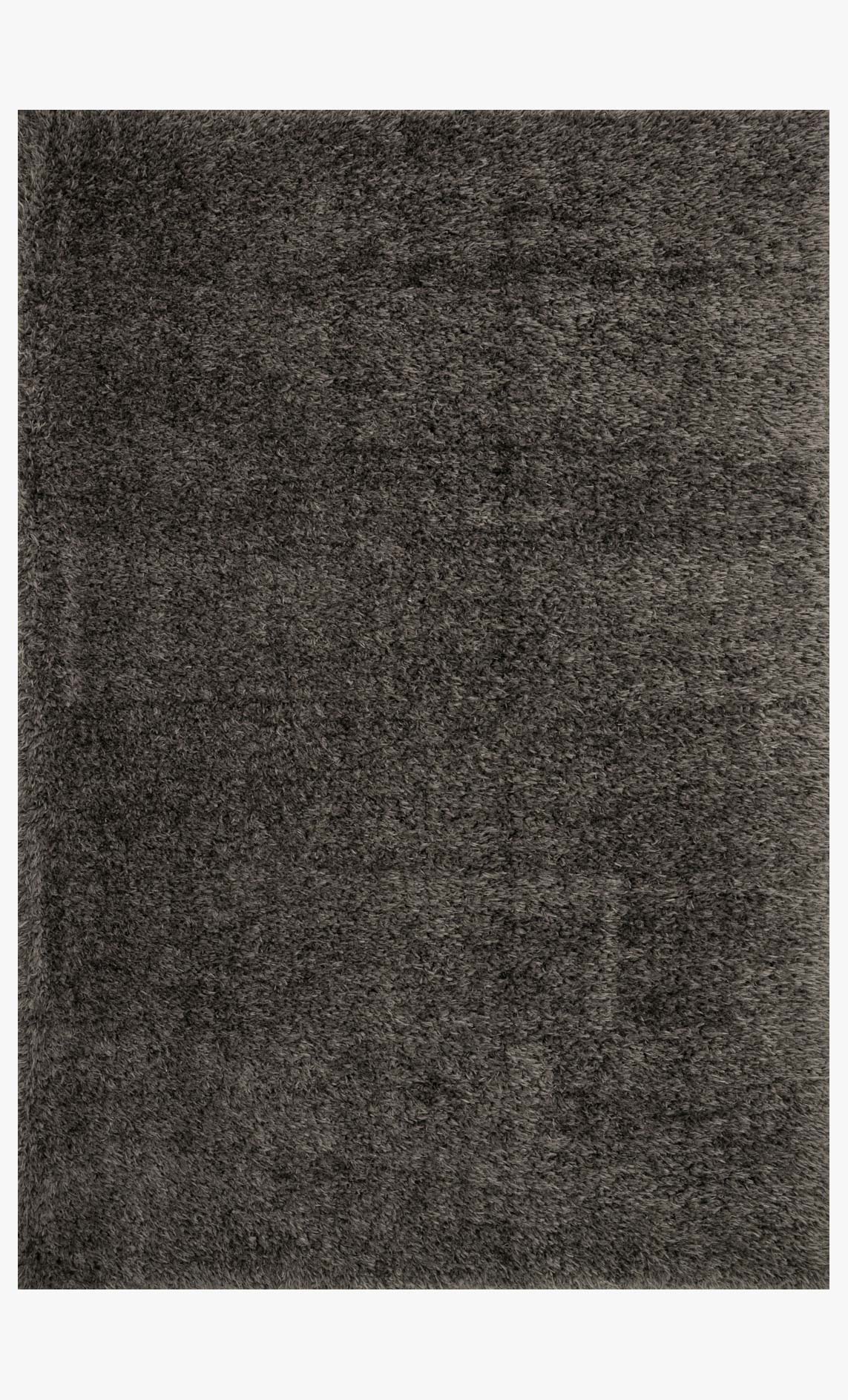 Grey shag power-loomed rug with dense, short pile texture, flat weave edges