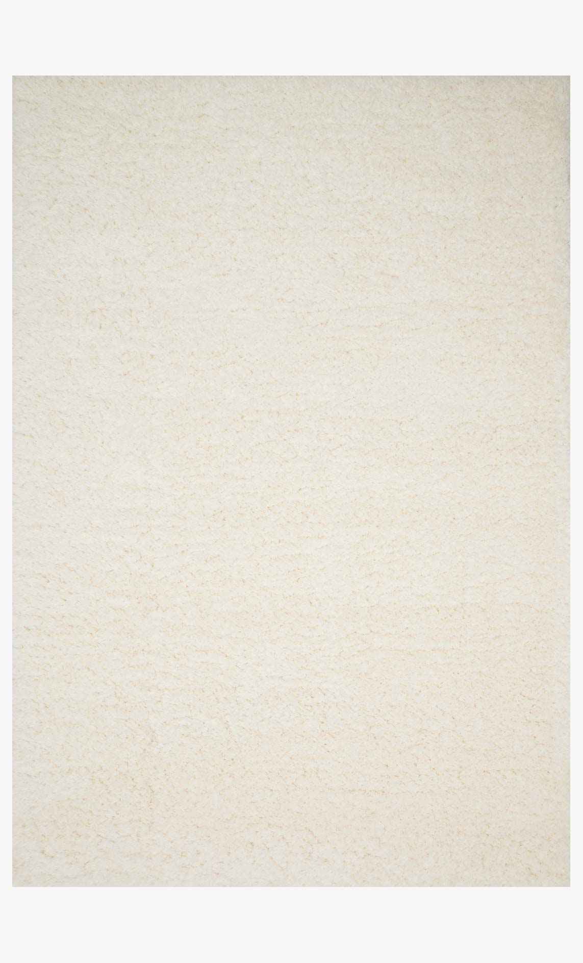 Ivory shag power-loomed rug with dense, soft-looking pile texture