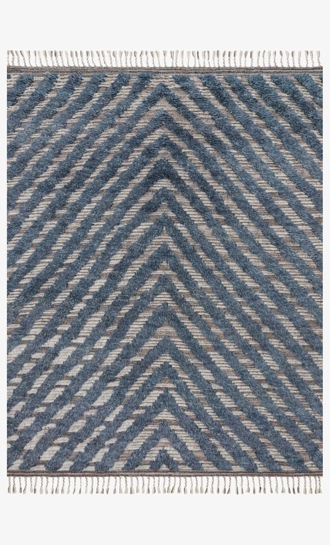 Hand-knotted rug with blue and pewter chevron pattern and white fringe border