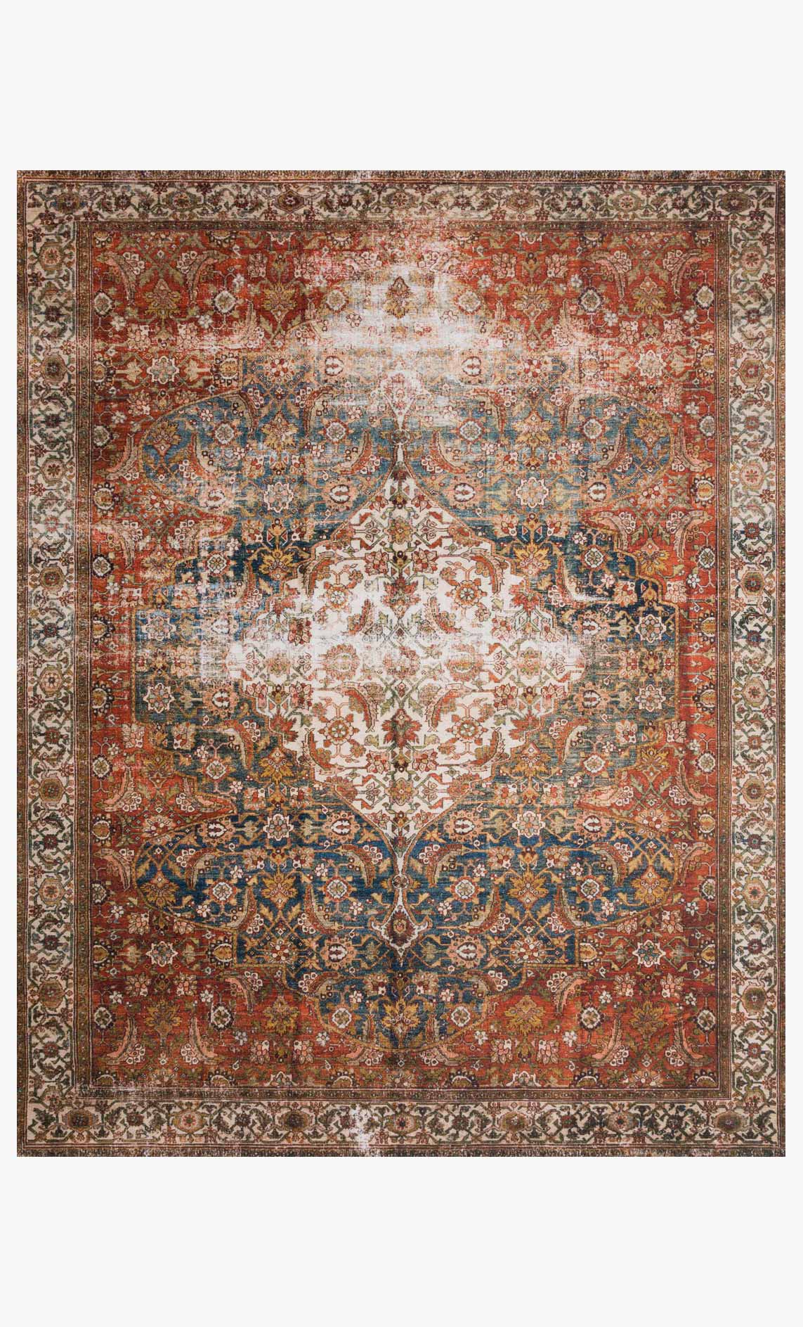 Traditional power-loomed rug with ornate medallion pattern, red, blue, and cream tones.