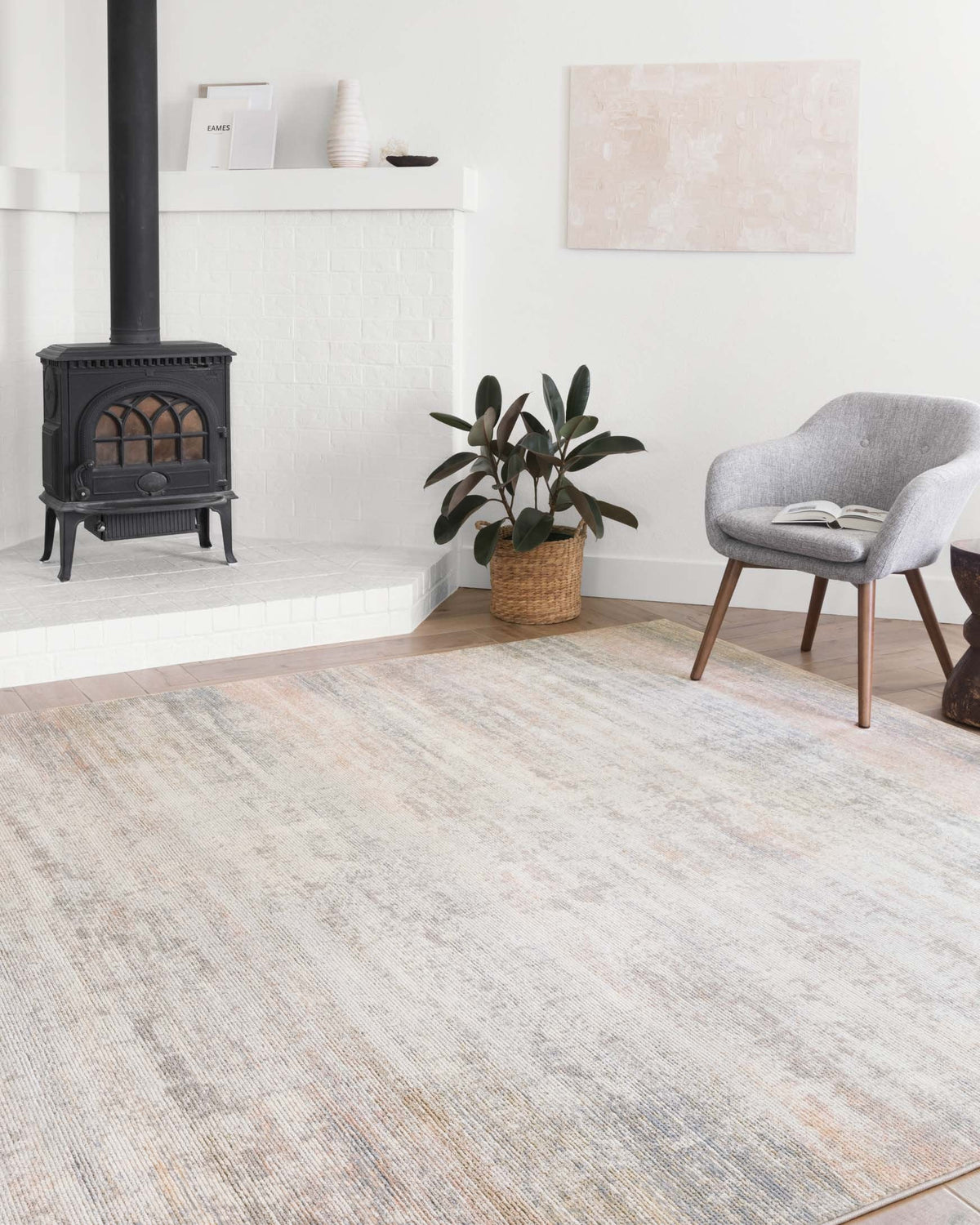 Transitional power loomed rug in mist tone with light beige, gray, and muted rust abstract texture