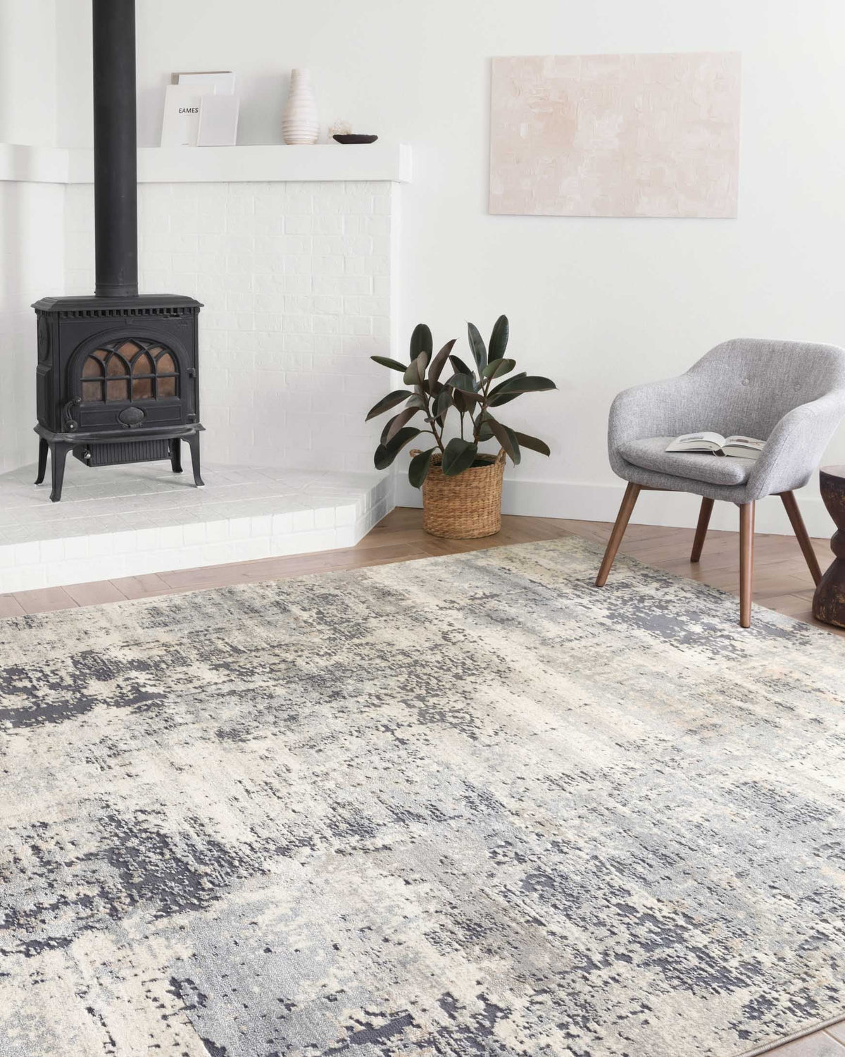 Large distressed abstract rug in granite gray and cream with speckled texture