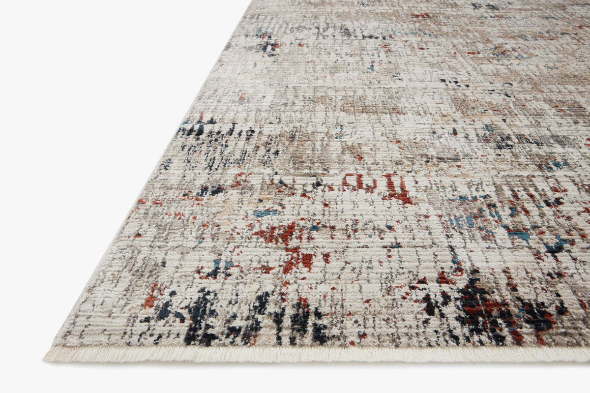 Ivory power-loomed rug corner with distressed multicolor abstract motif, low pile