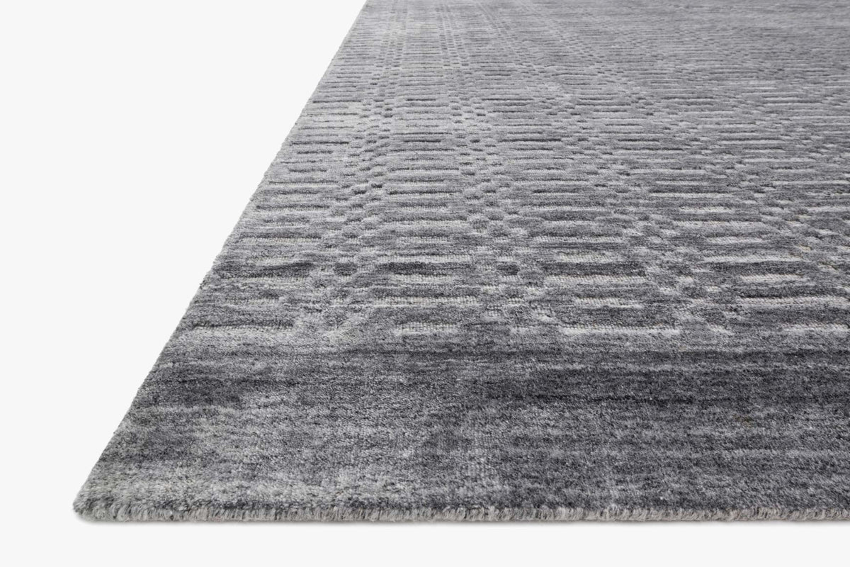 Contemporary hand-loomed rug, steel gray with stepped geometric motifs and low pile.