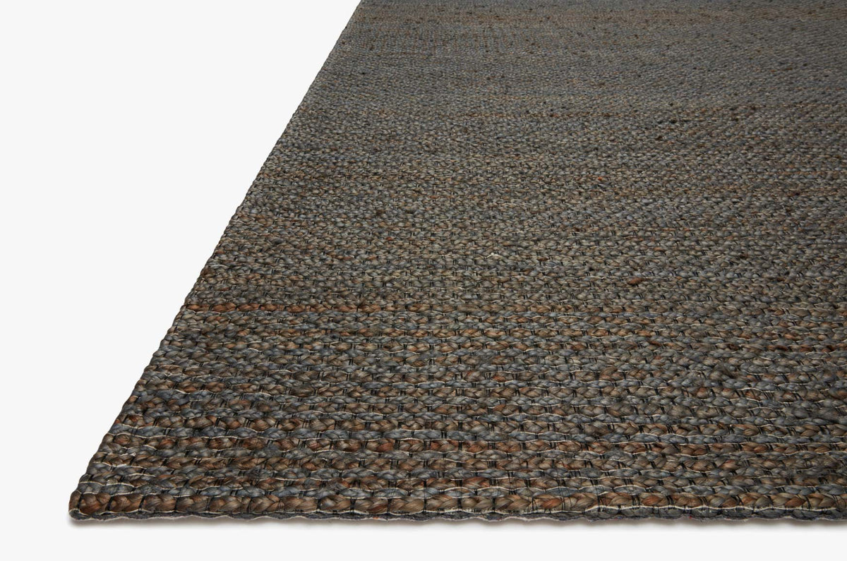 Contemporary hand-woven rug corner, flat braided edge; dark blue-gray speckled