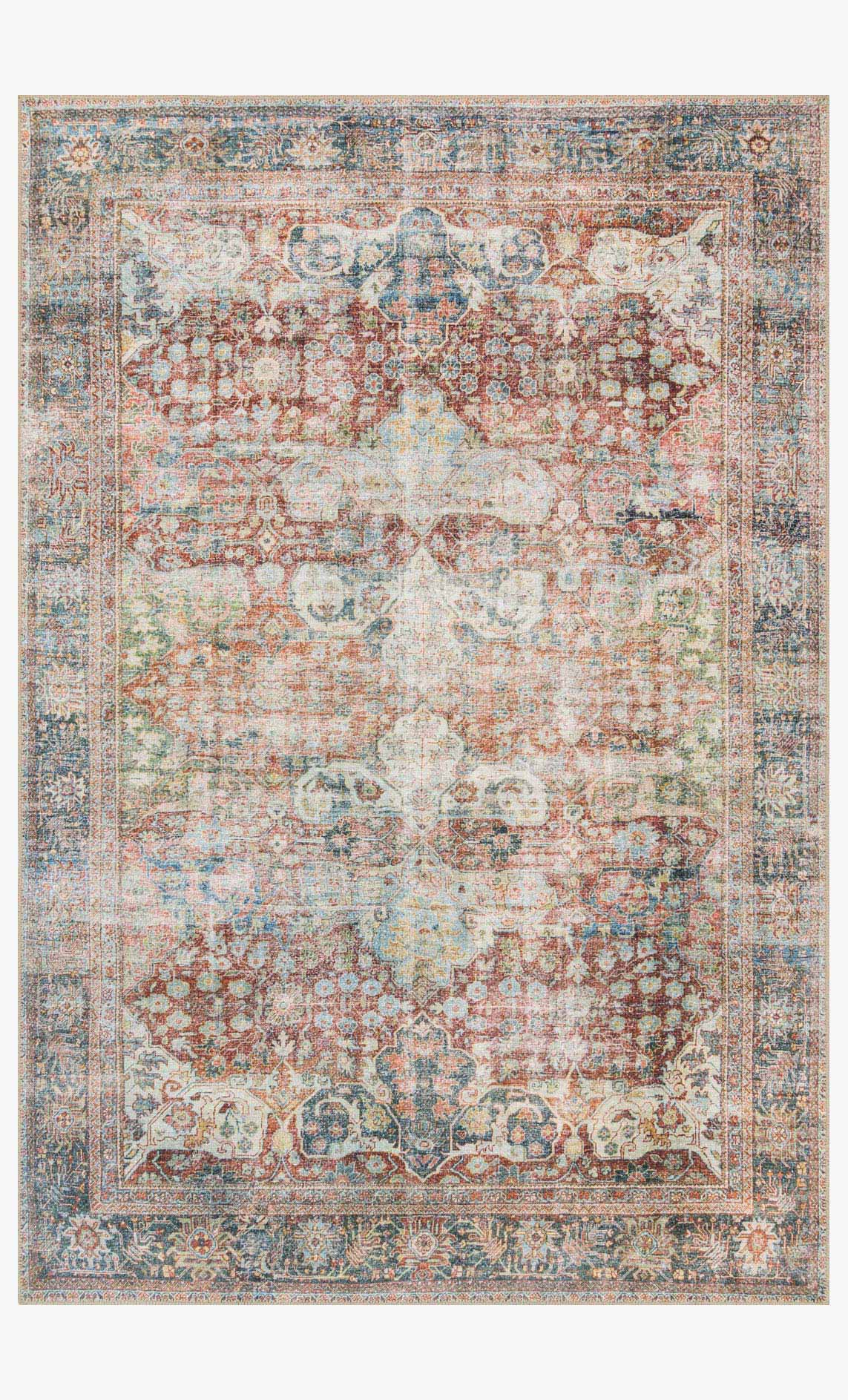 Traditional power-loomed rug with ornate medallion pattern, brick, blue, and cream tones.