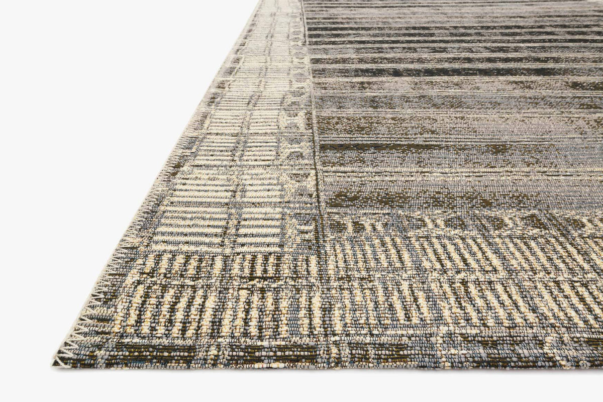 Charcoal and ivory power loom rug corner with bound edge and horizontal stripes