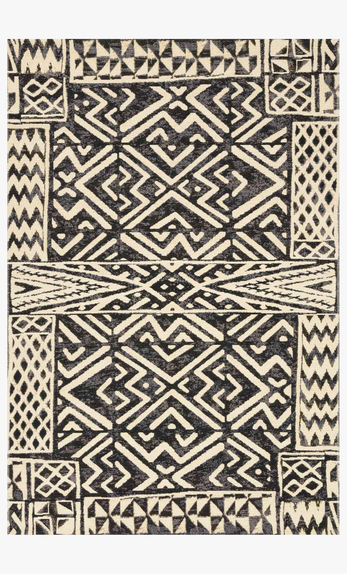 Ivory and black geometric indoor/outdoor rug with diamond, zigzag, and border patterns.