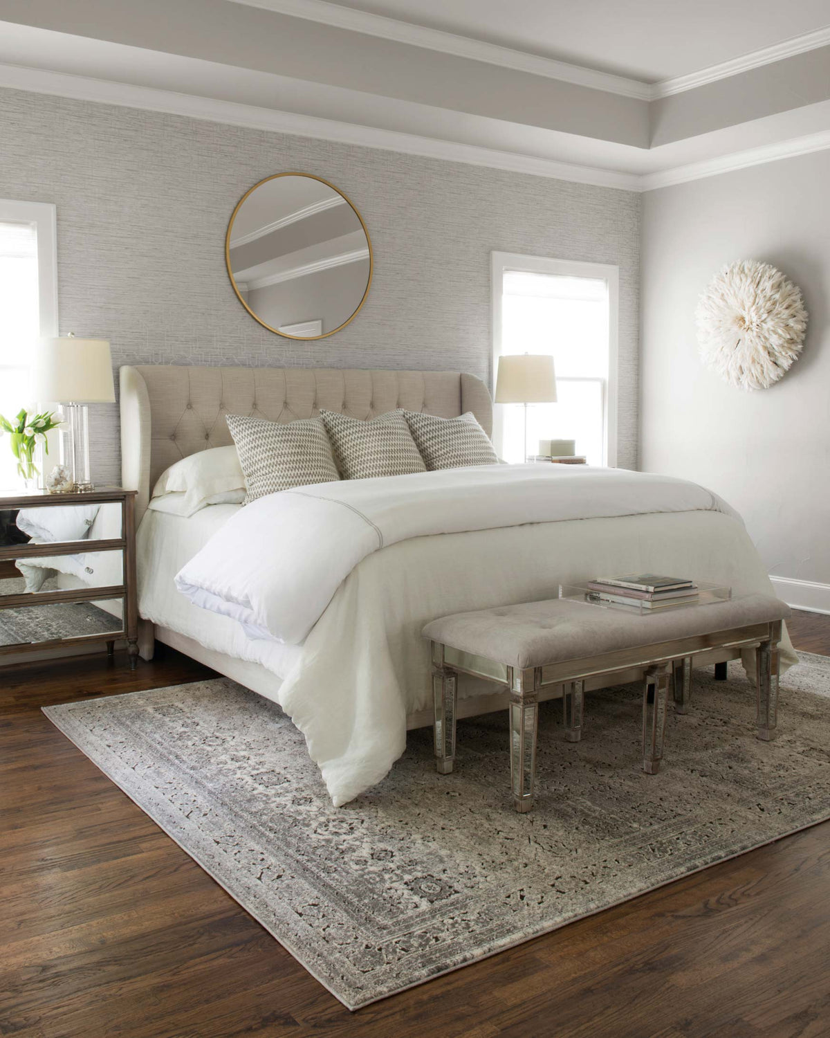 Grey and charcoal transitional rug with distressed medallion and geometric motif pattern