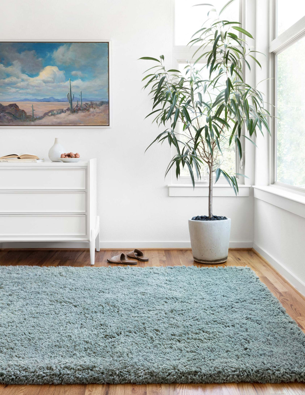 Spa teal shag rug lying flat, wide rectangular with plush high pile