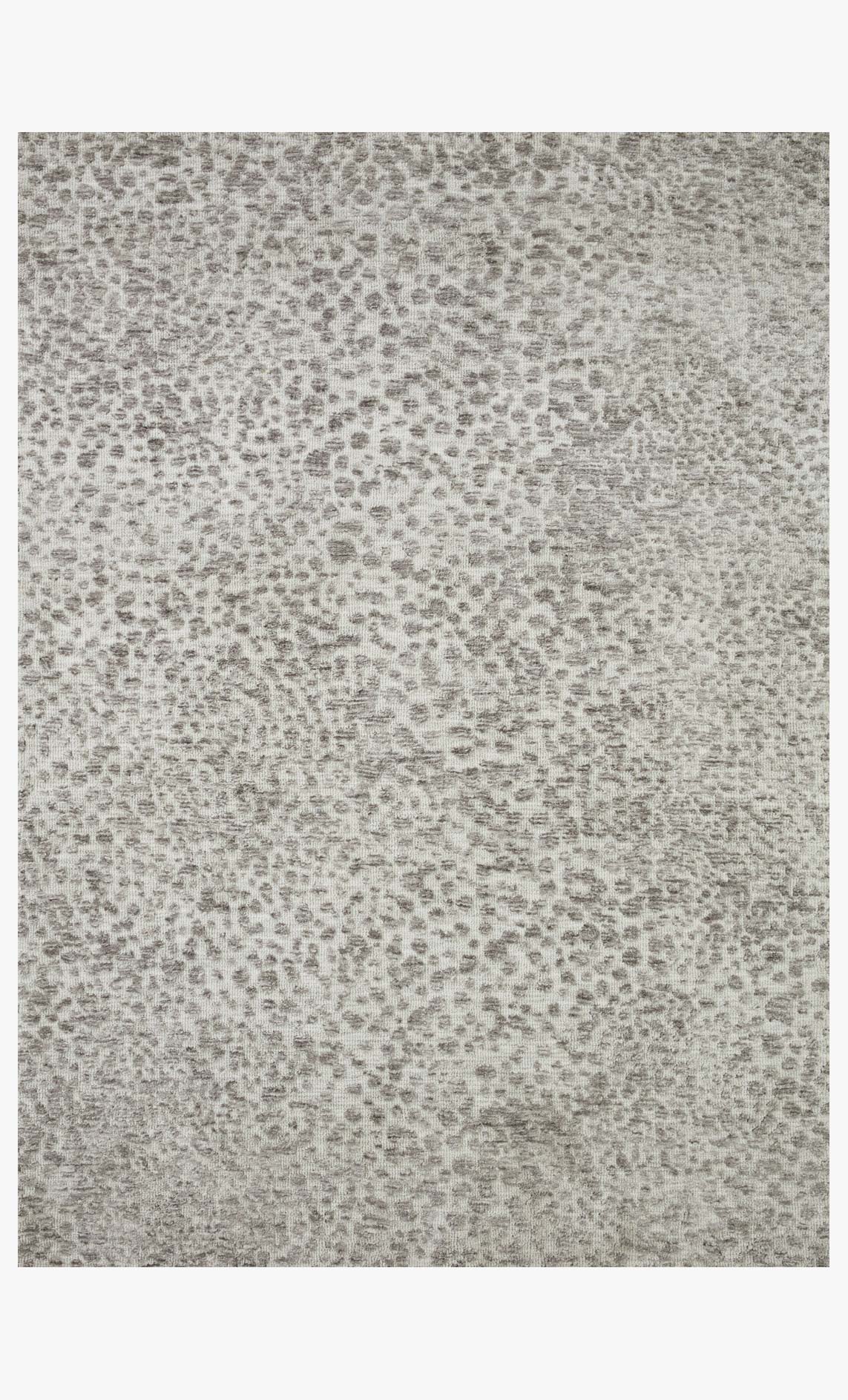 Silver and ivory transitional rug with dense speckled abstract pattern, short woven pile.