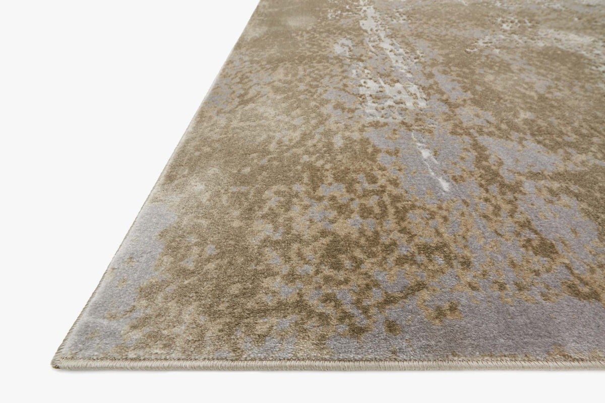 Corner view of transitional power-loomed rug with wheat-and-grey abstract distressed texture.