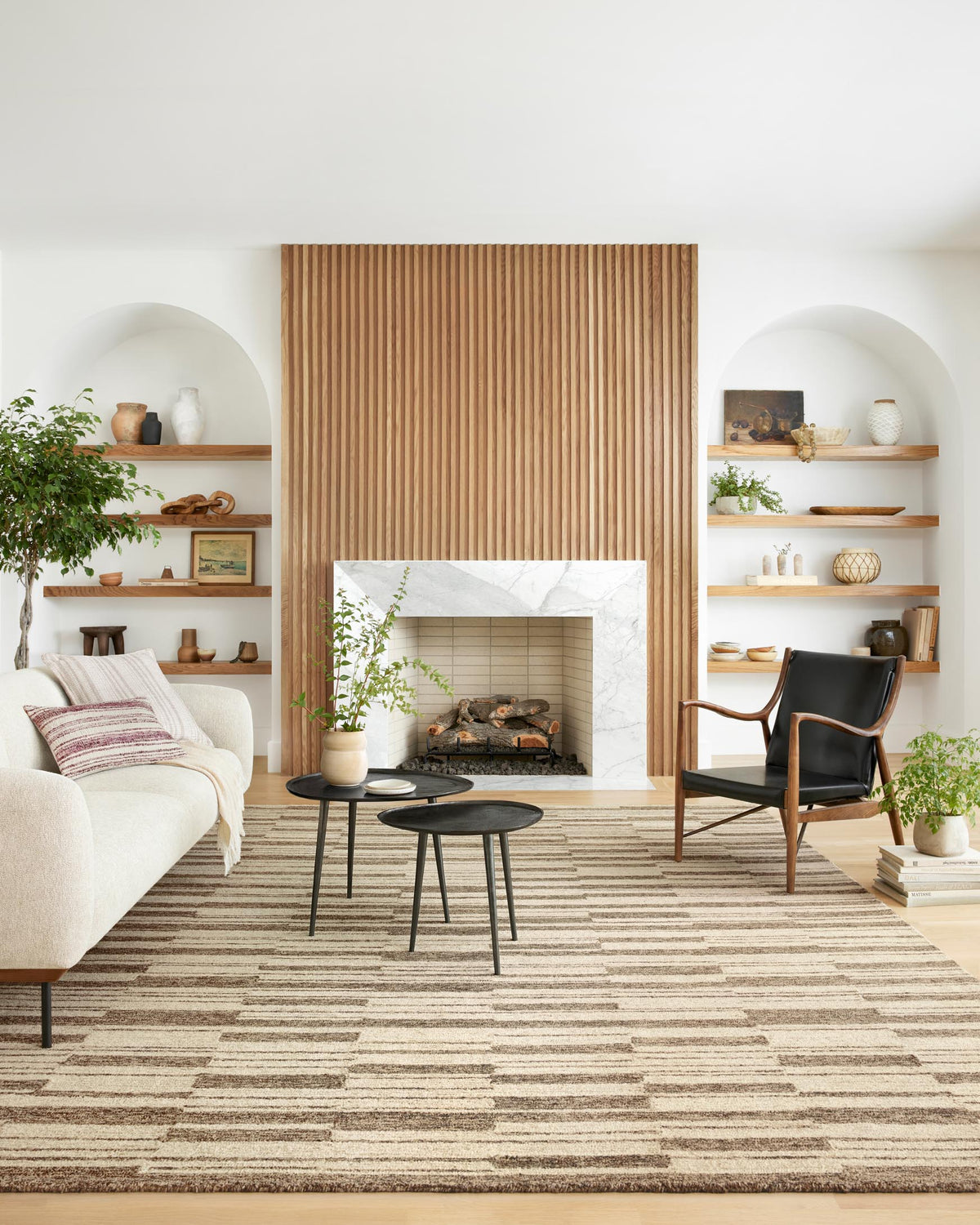 Beige and tobacco horizontal striped rug laid over the floor