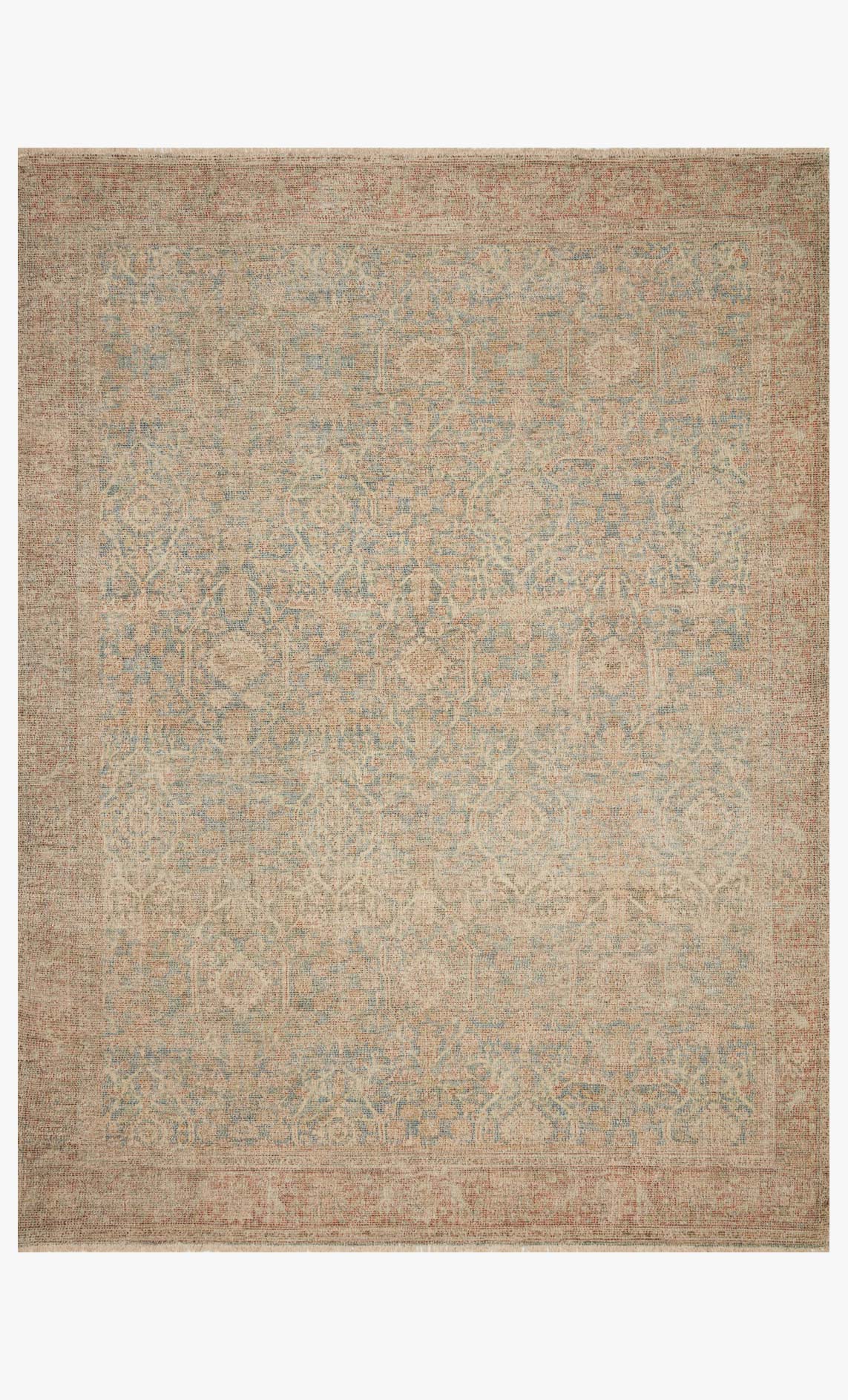 Transitional hand-woven rug in denim blue and rust with subtle medallion pattern