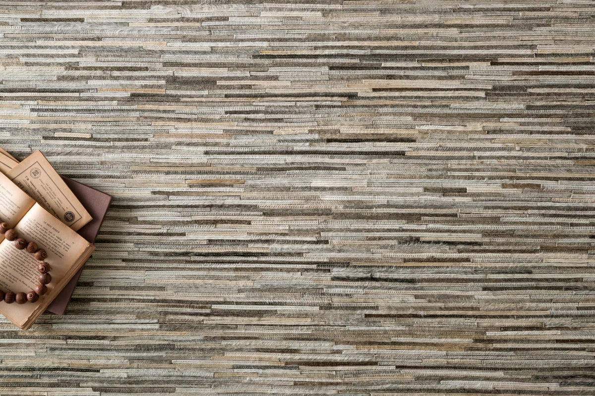 Silver and gray striped rug texture, horizontal bands with varying widths