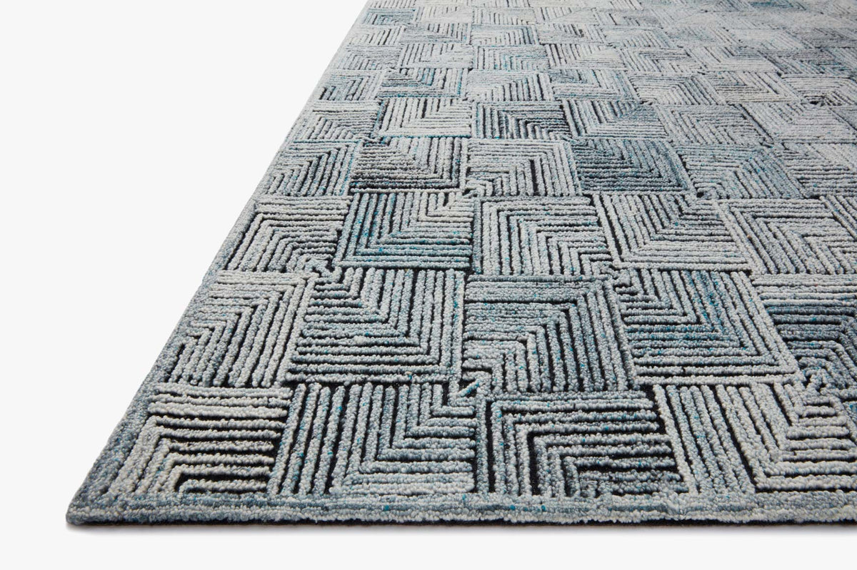 Loloi contemporary hooked rug, arctic blue and ivory geometric blocks in angled view