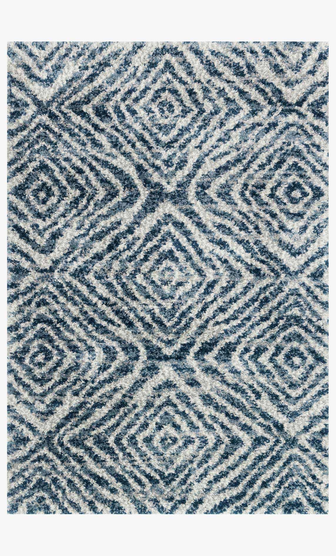 Shag power loomed rug, blue and cream geometric pattern in ocean and pebble tones
