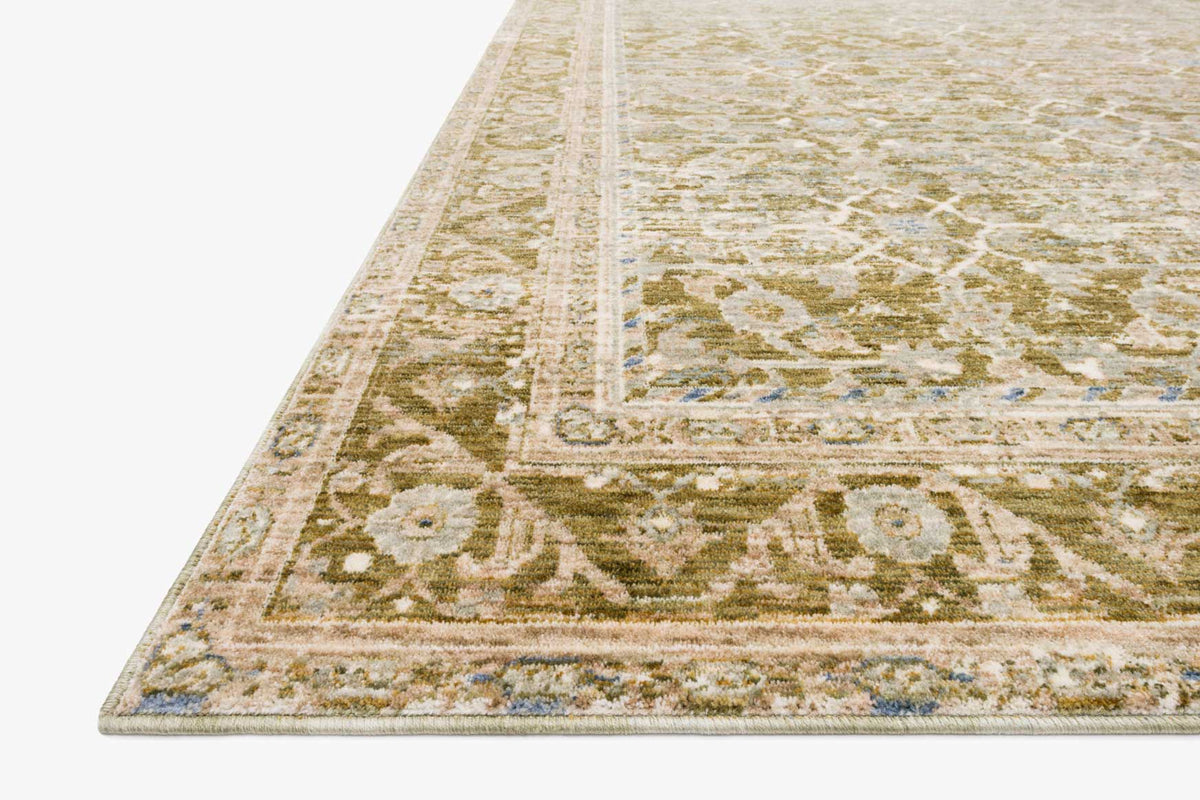 Traditional power-loomed rug corner with border and geometric pattern in beige and green