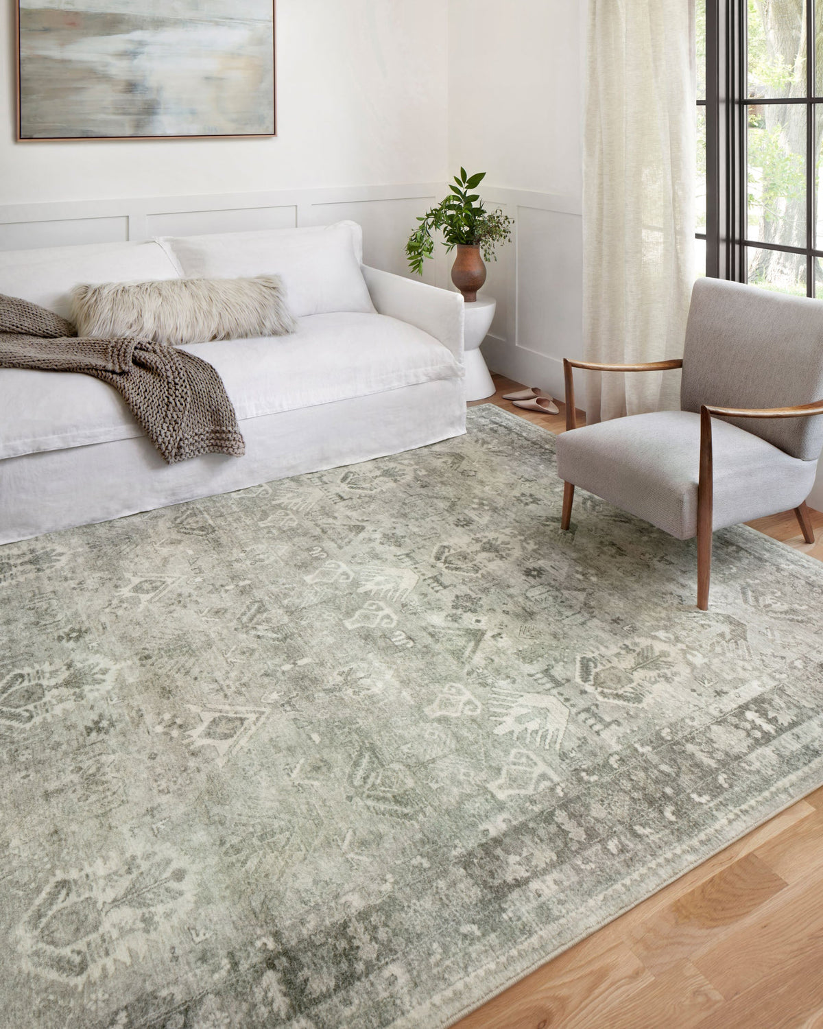Steel-gray power-loomed area rug with distressed geometric medallion motifs