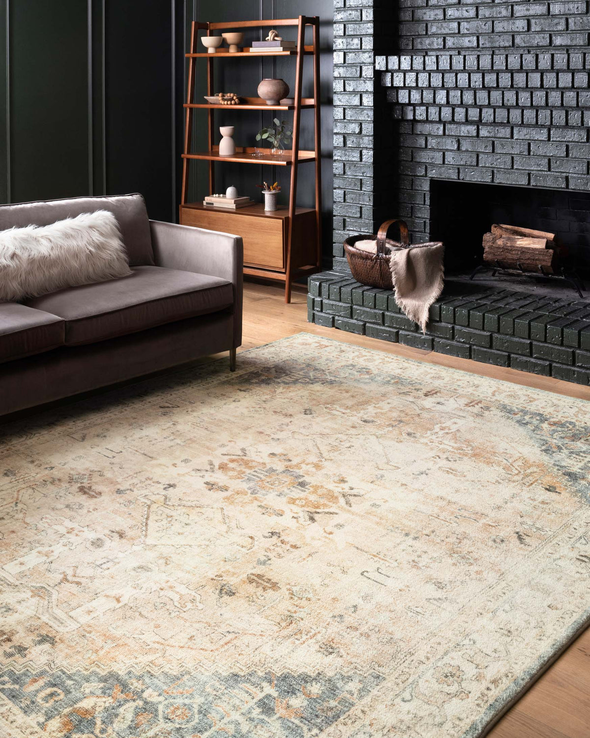 Clay and ivory traditional rug with faded geometric motif and blue-gray border