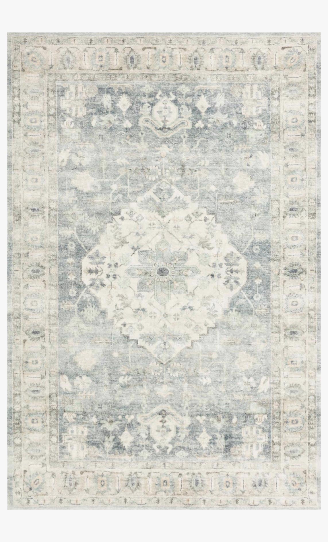 Traditional power-loomed rug in denim and fog with ornate medallion and border pattern