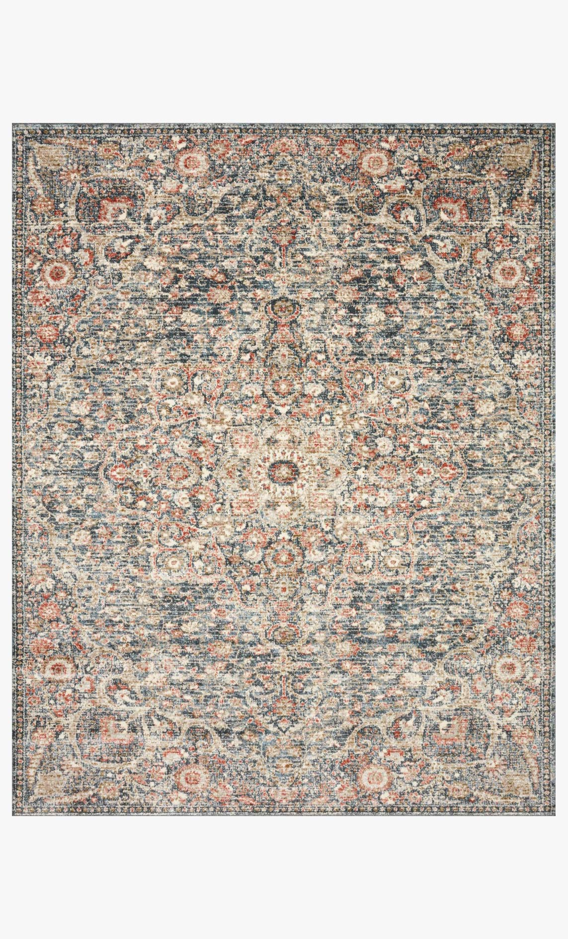 Traditional power-loomed rug with blue and spice medallion pattern, framed border.